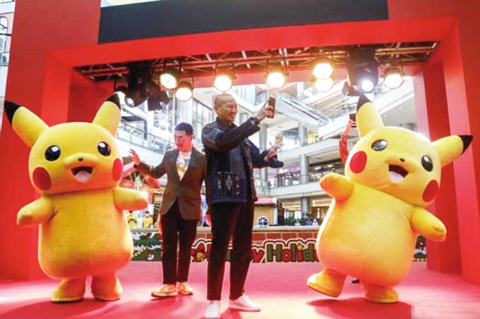 Menteri Pariwisata dan Ekonomi Kreatif Sandiaga Uno (tengah) di pembukaan Pokemon Festival Jakarta 2022, Pantai Indah Kapuk, Jakarta Utara, Kamis (8/12/2022).