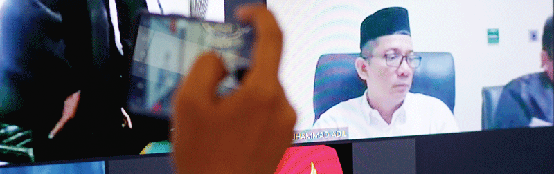 Bupati Kepulauan Meranti nonaktif Muhammad Adil  saat hadir secara virtual dalam sidang perdana yang digelar di Pengadilan Negeri Pekanbaru, Selasa (22/8/2023).