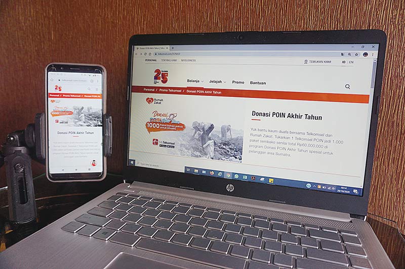 Program Donasi POIN Akhir Tahun Telkomsel terlhat di website www.telkomsel.com.(TELKOMSEL FOR RIAUPOS.CO)