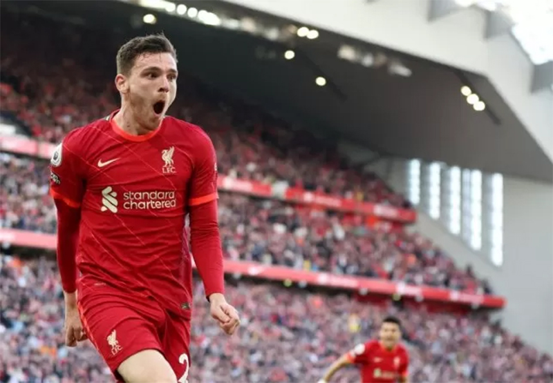 Selebrasi Andrew Robertson usai mencetak gol untuk Liverpool dalam pertandingan Liga Inggris melawan Everton, musim lalu.