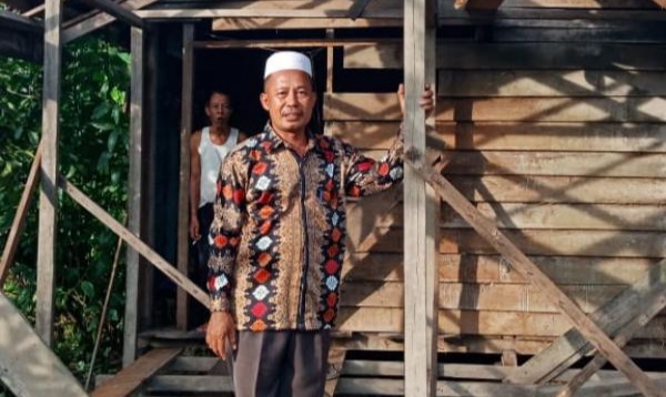 Kepala Desa (kades) Mengkopot, Kecamatan Merbau, Kecamatan Tasik Putripuyu, Kepulauan Meranti, H Ahmadi. FOTO: WIRA SAPUTRA/ RIAUPOS.CO