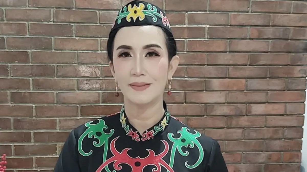 Dr Fitria Husnatarina